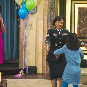 Yvette Saunders as Sergeant Harris with Michelle Obama on Disneys Jessie
