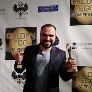 Jovanni posing with the awards 'Highway 58' won at the Golden Egg FIlm Festival in Los Angeles, California. 'Highway 58' won 'Best Ensemble Cast' and 'People CHoice Award', which is voted on by the audience.