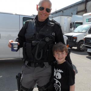 Flashpoint TV series  on set proudly sporting fake blood on his arm with Hugh Dillon June 2012