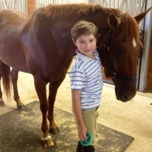 Blaze Tucker loves to ride horses Hes a pet lover and enjoys working with animals on set too