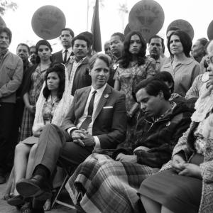 RFK in Cesar Chavez Jack Holmes as Senator Robert F Kennedy celebrates Holy Mass of Communion with Michael Pena as Cesar Chavez With America Ferrera Rosario Dawson Jacob Vargas and Wes Bentley pictured