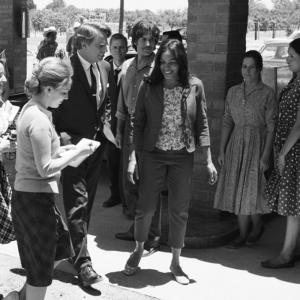 RFK in Cesar Chavez Jack Holmes as Sen Robert F Kennedy walks with Rosario Dawson as Dolores Huerta in Cesar Chavez Wes Bentley also pictured