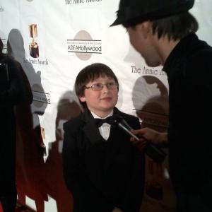 Matthew being interviewed on the red carpet at the 39th Annual Annie Awards in Los Angeles CA Feb 4 2012
