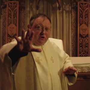 Still of Laurence R. Harvey in The Editor (2014)