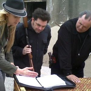 First Assitant Director Iabou WIndimere Director Randy Fabert and Acotr Doug Palmer discussing the script on the set of Psycho Killer 2010 Skylar Phoenix Productions Randy Fabert