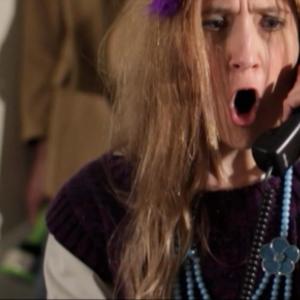 Screen shot of Iabou Windimere as the Magicians Assitant Tanya Rococo from the 