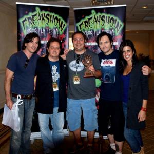 The Black Waters of Echo's Pond Producer Jason Loughridge, Director/Writer Gabe Bologna, Writer/Producer Sean Clark and actress Electra Avellan accepting the award for Best Picture at the Freakshow Film Festival in Orlando, FL.