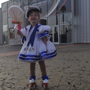 After three days of figure skating competition and three 1st place medals at Anaheim Rosanna ready to roller skate home Sailors costume customdesigned and custommade by Oxana Foss