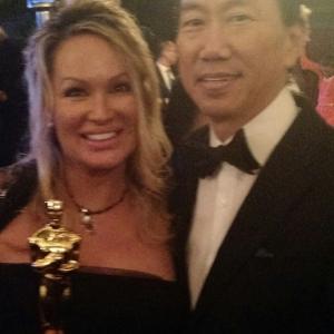 Lisa Christiansen with Gene Chang at the Oscars 2015