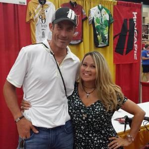 Tour de Force life strategist Lisa Christiansen and Tour de France cycling legend George Hincapie make an appearance at the 2014 HHH100 expo before riding the 100 mile endurance ride in triple digits through hells gate
