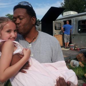Chalky (Kelvin Payton) and Young Harper (Kaelynn Wright) on the set of Mulberry Stains