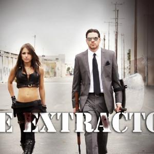 Liz Katz and Sam Macaroni in GUNS & GADGETS - The Extractor (2012)