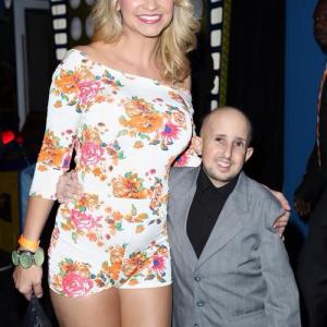 Mindy Robinson of King of the Nerds and Ben Woolf of American Horror Story pose as they both attend the Geeks Only Event at Dave and Busters in Hollywood