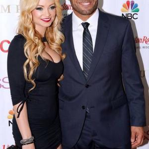 Randy Couture and girlfriend actress Mindy Robinson walk the carpet at the 2014 Miss USA pageant.