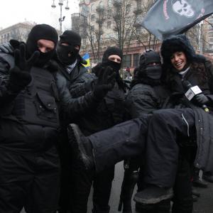 Reporting in Kiev Ukraine during - a moment of lightness with protesters. April 2014