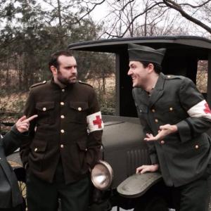 Production Shot: Walt meets two new friends in France as part of the ambulance core in World War I.