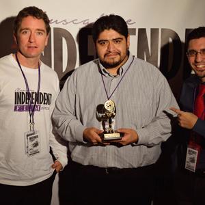 HUGO MATZ receiving the award for BEST SHORT FILM at the 2014 Muscatine Independent Film Festival