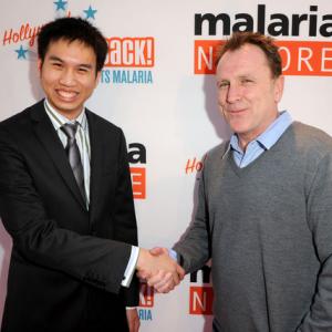 Michael Nguyen L and actor Colin Quinn arrive at Malaria No More Presents Hollywood Bites Back! held at Club Nokia LA Live on April 16 2011 in Los Angeles California