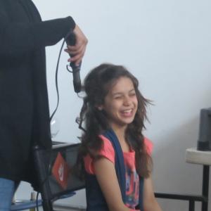 Maile on set of Written by a Kid 
