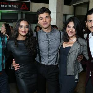 Director Christopher Landon poses at the Paranormal Activity: The Marked Ones premiere with actors Gabrielle Walsh, Andrew Jacobs, Noemi Gonzalez, and Richard Cabral.