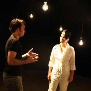 Dir. Matthew Walker working with singer Angie Raess on the set of her new music video, 