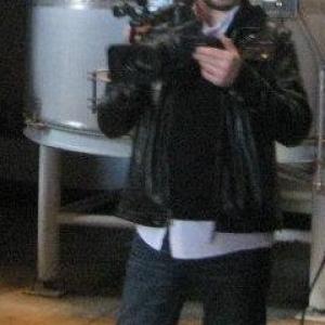 Matthew Walker operating a camera on location with Uncorked