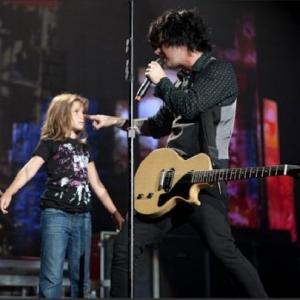 Alyssa doing a skit on stage with Billy Joe during a Green Day concert