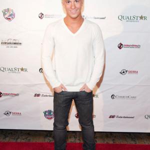 Actor and choreographer Kyle Blitch arrives at Nadya Sulemans 36th birthday party at the House of Blues Parish Room on July 13 2011 in Los Angeles California