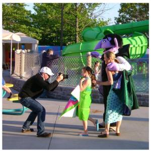 Still image of water park fun at Sesame Place featuring Jodie Shultz as mom Leila Jean Davis as daughter and The Count as himself Directed by Mark Claywell