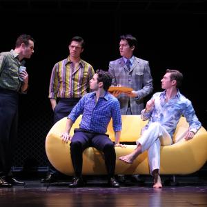 As Bob Crewe (seated, at right) in JERSEY BOYS