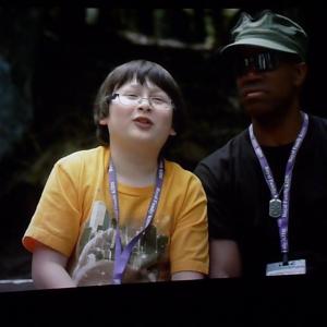 Still shot, from the feature film CAMP, shows Matthew Jacob Wayne as 'Redford', with Asante Jones as 'Counselor Samuel'.