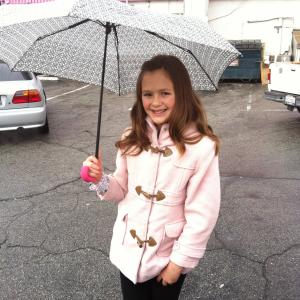 on set in the rain for the film Dennis by Jefferson Dutton