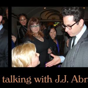 Zachary Alexander Rice and JJ Abrams talking at the Super 8 Red Carpet premiere