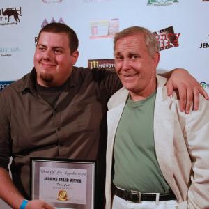 Andrew posing on the red carpet with friend and actor G Larry Butler at the 2014 Los Angeles 48 Hour Film Projects Best of LA screening where Press COOK 2014 screened