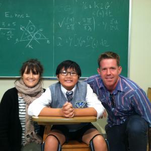 Matthew Zhang, Nerd Asian Actor on The set of Are You Smarter than a 5th Grader? (2012) with Director: Melissa B. Cleaner and the producer.
