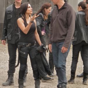 Yasmine Aker on the set of 'Divergent' consulting with Director, Neil Burger