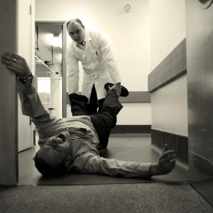 LR James Frame as Kirkwood Lee McCann as Doctor in asylum