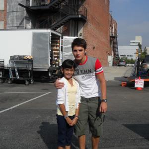 Emily with Gregg Sulkin at the 'White Frog' set.