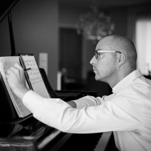 Composer Joris Hermy at the piano