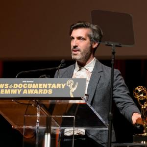 Tom Brass accepting a 2015 Emmy award for Outstanding graphic design and art direction
