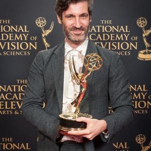 Tom Brass winning a 2015 Emmy award for 'Outstanding graphic design & art direction' for the PBS series, 'Your Inner Fish'