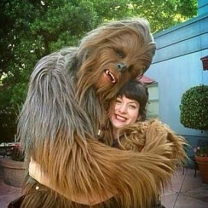Bonnie Burton gets a Wookiee hug from Chewbacca.