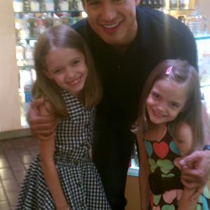 Mykayla and sister Hannah with Mario Lopez at the launch of the Vinci tablet.