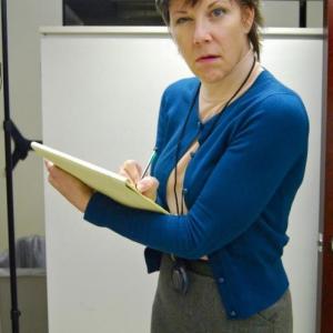 Grumpy TV station efficiency officer, Ruth Frankelsheim, in Smithereen TV