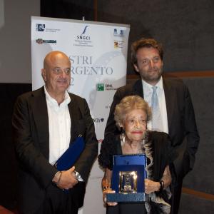Silver Ribbon Award to Giovanna Cau Marco Spagnoli winner of Special Prize with Luciano Sovena CEO Cinecitt Luce