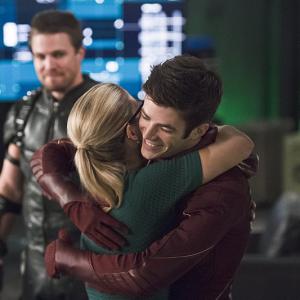 Still of Stephen Amell Grant Gustin and Emily Bett Rickards in The Flash 2014