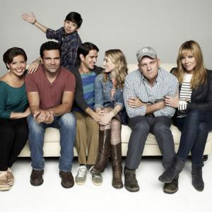 Still of Mary McCormack, Mike O'Malley, Justina Machado, Caroline Yoder, Ella Rae Peck, Demetrio Hernandez and Joseph Haro in Welcome to the Family (2013)