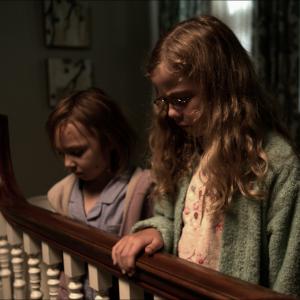 Still of Megan Charpentier and Isabelle Nélisse in Mama (2013)