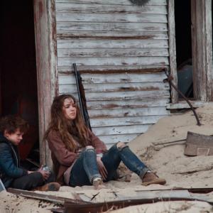 Still of Max Charles and Haley Lu Richardson in The Last Survivors 2014