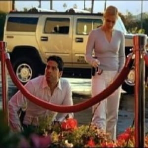Still of Emily Procter and Adam Rodriguez in CSI Majamis 2002